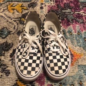 Woman’s checkered Vans